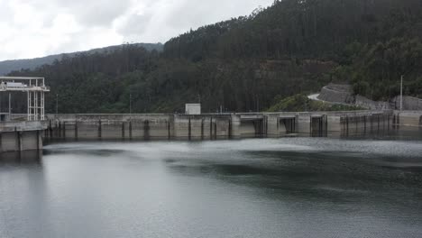 FlyOver-Couto-de-Esteves-Dam,-reservoir-on-the-vouga-river