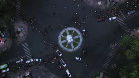 Traffic-roundabout-at-night-from-top-down-drone-shot