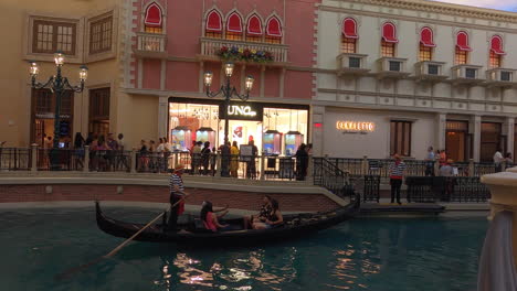 Tourists-on-Gondola-Boat-at-Canal-Shoppes-Mall-Inside-Venetian-Resort-on-Las-Vegas-Strip