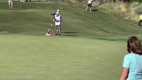 Rickie-Fowler-sinks-a-long-putt-at-the-US-Open,-celebration-follows