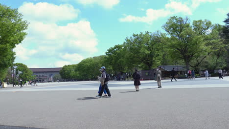 TOKYO,-JAPAN---APRIL-8,-2023:-People-walking-in-Ueno-park-during-springtime-in-April