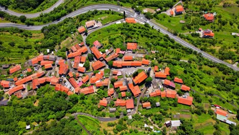 Stunning-4K-drone-footage-of-the-iconic-Črni-kal-village-in-Slovenia,-a-masterpiece-of-architecture-amid-breathtaking-natural-surroundings