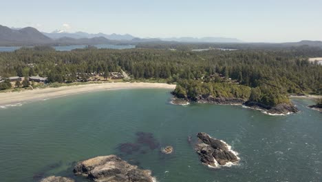 Drone-footage-of-a-beach-with-islands-at-Tofino-on-the-Vancouver-Island-in-BC,-Canada