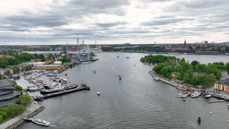 Beautiful-waterways-in-Stockholm-Sweden---Aerial-facing-south-east-towards-Grona-Lund-in-Djurgarden-island-and-Danviken