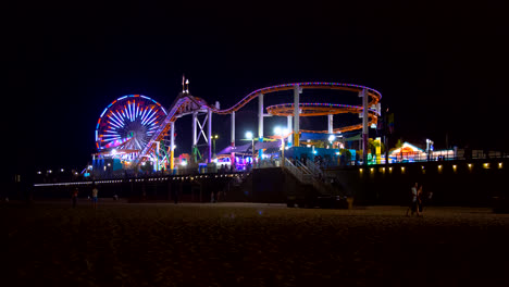 A-4K-time-lapse-of-the-Santa-Monica-Pier-Ferris-Wheel-and-Rollercoaster-in-Santa-Monica,-California,-USA-on-09-01-2019