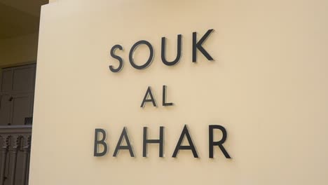 Dimensional-Sign-At-The-Front-Exterior-Wall-Of-Souk-Al-Bahar-Mall-In-Dubai,-UAE---close-up