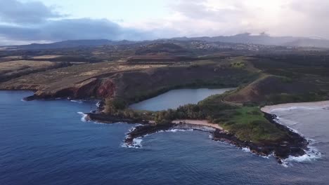 Drone-Flying-Towards-Salt-Pond-Beach-Park-In-Kauai,-Hawaii---aerial
