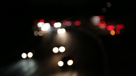 Blurred-city-traffic-lights-from-cars-on-the-freeway