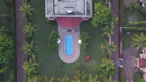 Aerial-Top-View-Of-Hotel-Landscape-At-The-Lalit-Golf-And-Spa-Resort-In-Canacona,-Goa,-India---aerial-ascend