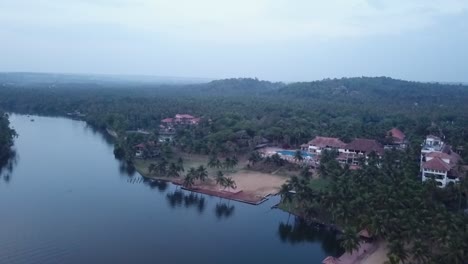 Aerial-View-Of-Isola-Di-Cocco-Beach-Resort-In-Poovar,-Trivandrum-District,-Kerala,-South-India---aerial-drone-shot