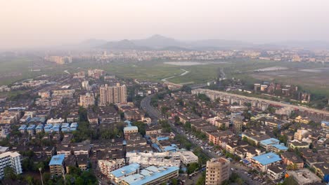 Panoramic-View-on-the-Municipality-of-Vasai,-Mumbai,-India---aerial-drone-shot