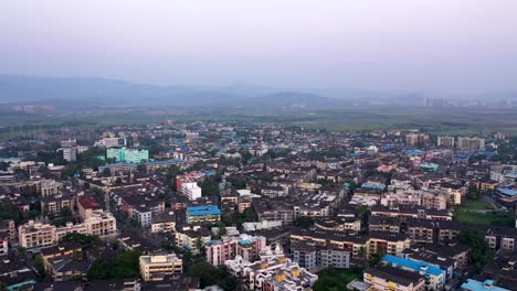 Cityscape-Of-Vasai-Near-Mumbai,-India---aerial-drone-shot