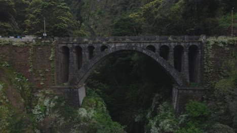 Drone-view-of-the-old-bridge-in-Madeira-Island,-Portugal