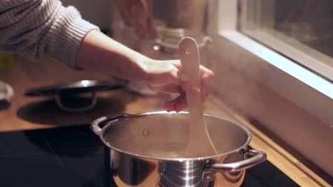 "Cooking-up-Penne:-Slow-Motion-Close-up-of-Pasta-Boiling-in-a-Pot