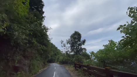 Driving-On-The-Mountain-Road-In-Tyrna-Village-Heading-To-Rainbow-Falls-In-Cherrapunji,-Meghalaya,-India