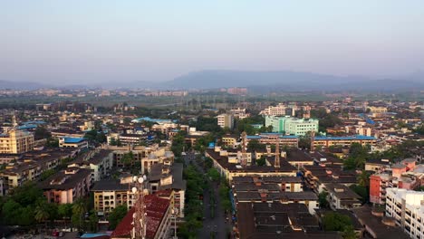 Drone-Flight-Over-Commercial-And-Residential-Buildings-In-Suburban-Vasai,-Mumbai---aerial-shot