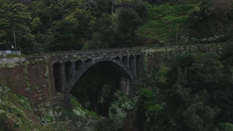 Drone-view-of-old-bridge-in-Madeira-island,-Portugal