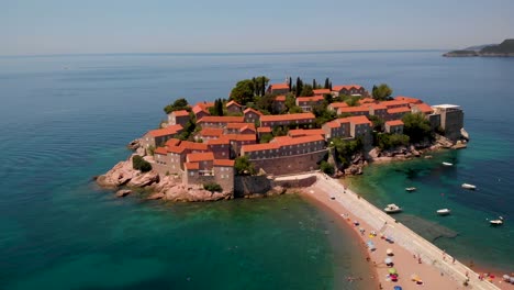 Sveti-Stefan-Island-Connected-To-The-Mainland-By-A-Narrow-Tombolo-In-Budva,-Montenegro