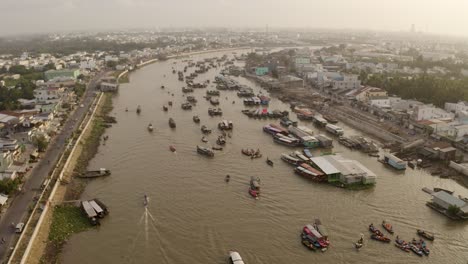 Aerial-view-of-floating-market,-Song-Can-Tho-River-in-Cai-Rang-Vietnam