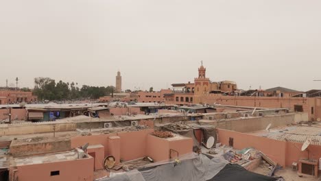 High-Angle-panning-view-of-the-rooftops-and-old-city-of-Marrakesh,-Morocco