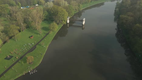 A-breathtaking-aerial-view-of-the-Elbe-River-with-the-abandoned-lock-building