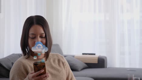 Woman-using-her-phone-while-data-being-synchronized-to-cloud-computing-online-storage-and-IOT-computer-network-connectivity-for-devices