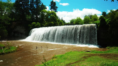 Slow-Motion-Wide-shot-of-Rere-falls-waterfall,-Gisborne,-New-Zealand