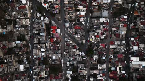 Aerial-view-above-houses-and-streets-in-favela-Naucalpan,-Mexico-city---top-down,-drone-shot