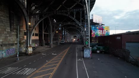 Rough-looking-industrial-area-in-Harlem,-NYC-with-street-art-and-graffiti