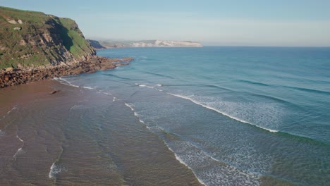 Aerial-View-Of-The-Coastline,-Cliffs-At-Playa-de-Tagle