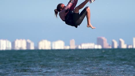 Los-Alcazares,-Spain,-May-3,-2023:-Sportsman-practicing-kite-surf-sport-at-the-beach-on-a-windy-day-at-the-Spanish-coasts