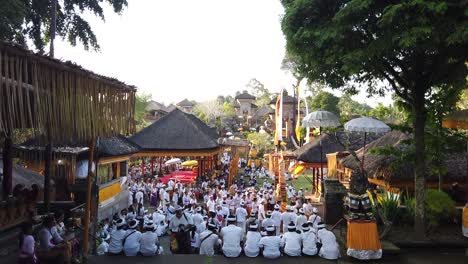 Procession-Inside-Balinese-Temple-Ceremony,-People-Dressed-in-White-Clothes,-Festival-Colorful-Ceremony-in-Bali-Indonesia,-Pura-Samuan-Tiga