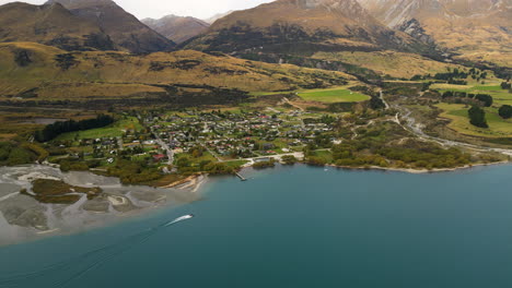 Glenorchy-township-with-majestic-landscape-in-New-Zealand,-aerial-view