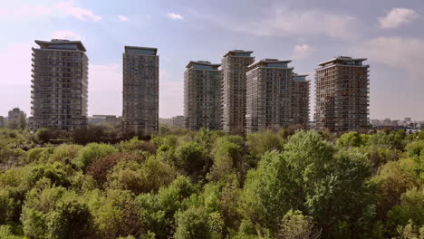 City-skyline-residential-buildings-from-Vacaresti-natural-reservation,-Bucharest-Romania