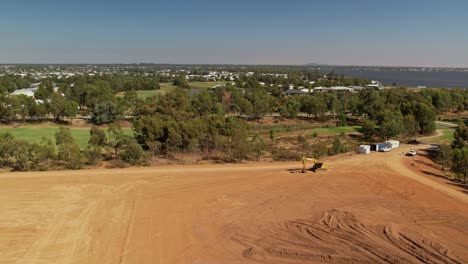 Yarrawonga,-Victoria,-Australia---3-March-2023:-Excavator-on-the-new-residential-stage-area-at-Black-Bull-Golf-Club-Yarrawonga