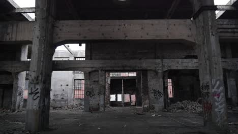 Destruction-and-debris-in-crumbling-halls,-abandoned-scary-place---urban-exploration