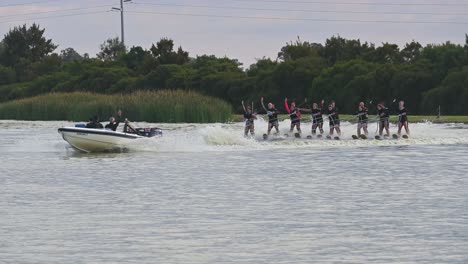 Mulwala,-New-South-Wales,-Australia---24-March-2023:-Multiple-skiers-practicing-at-Max-Kirwan-Water-Ski-Park-in-Mulwala-NSW