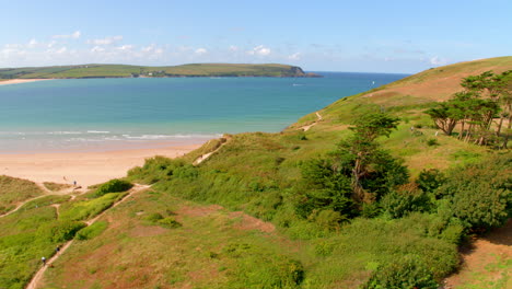 Aerial-view-of-Daymer-Bay-and-Rock-Beach-in-north-cornwall,-near-Rock-and-Padstow