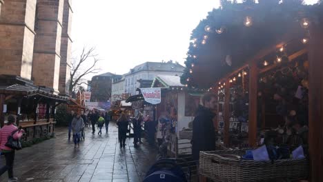 A-christmas-market-in-Marburg,-Germany-next-to-Elisabeth-Chruch