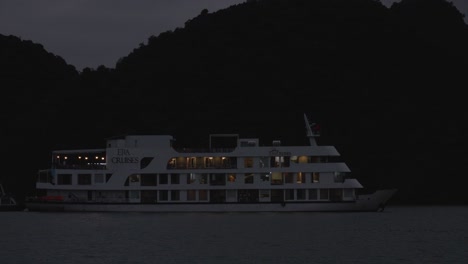 Nighttime-shot-of-a-cruise-ship-anchored-in-Ha-Long-Bay