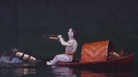Marioneta-De-Agua-Thang-Long---Pescador-En-Un-Barco-En-Hanoi,-Vietnam