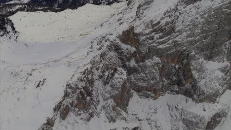 Aerial-Overhead-Shot-Of-Snow-Covered-Mountain-Top-Of-Sass-de-Putia-Range
