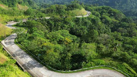 Scenic-Landscape-View-of-lush,-tropical-rainforest-with-winding-roads-along-the-mountainside