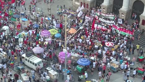 Drone-view-of-protesters-against-Bolsonaro-in-the-center-of-Rio-de-Janeiro,-Brazil