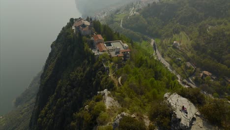 -Aerial-drone-panoramic-view-of-scenic-Tignale-village-on-Lake-Garda-in-Italy-and-natural-surroundings