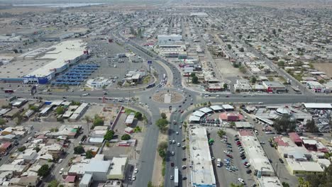 View-from-a-drone-flying-still-over-the-city-of-Mexicali-showing-far-away-a-monument-of-the-mexican-ex-president-Francisco-Zarco-in-the-middle-of-a-roundabout