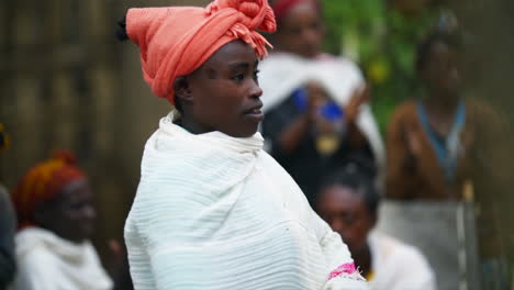 Ethiopian-Dorze-tribal-woman-closeup-dancing-with-teal-headwear