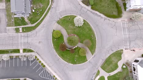 Homer,-Michigan-downtown-roundabout-with-drone-video-moving-up