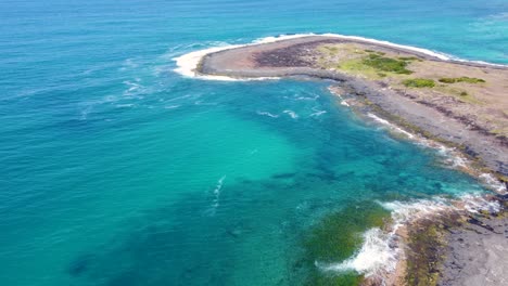 Aerial-drone-coastline-shot-of-Bawley-Point-headland-South-Coast-clear-ocean-reef-travel-tourism-rocky-headland-landscape-scenery-NSW-Australia-4K