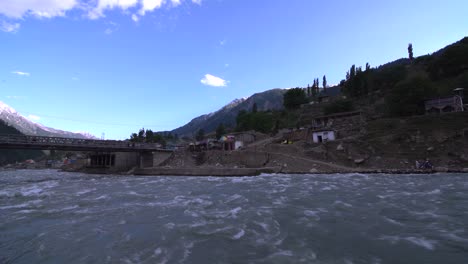 River-Swat-flowing-under-a-bridge-in-KPK